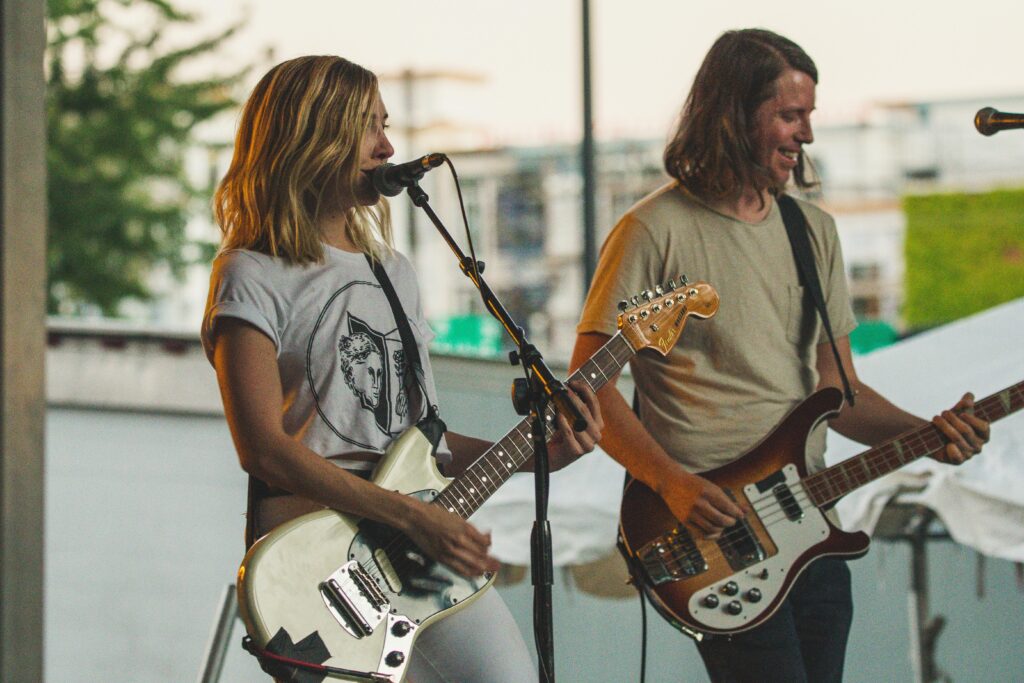 Myrtle Beach live music performers with guitars.