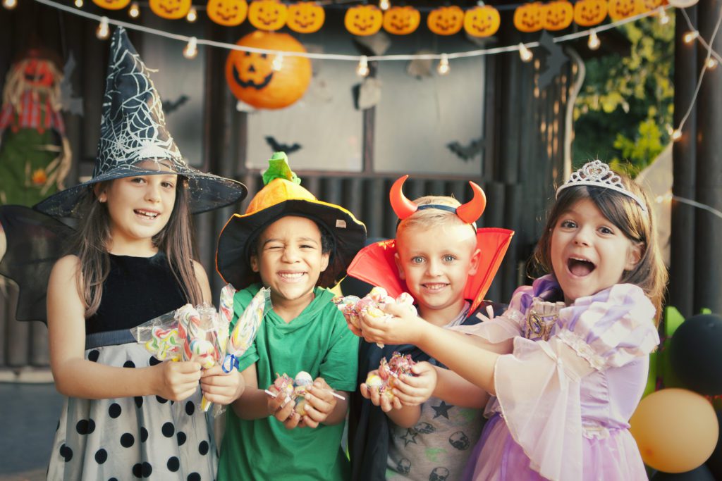 Group of kids enjoying trick or treating on Halloween in Myrtle Beach.